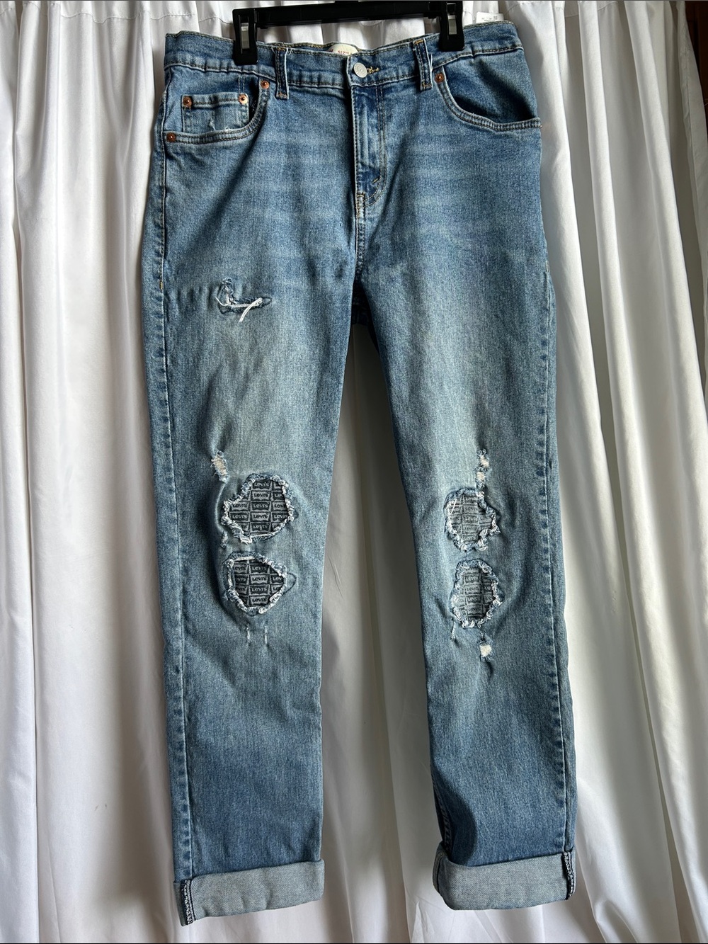 Levi's 512 Slim Taper Light Blue Ripped Jeans with Logo Patch